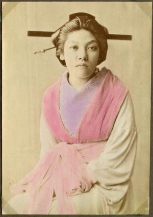 Japansk kvinde med chopsticks i håret.
