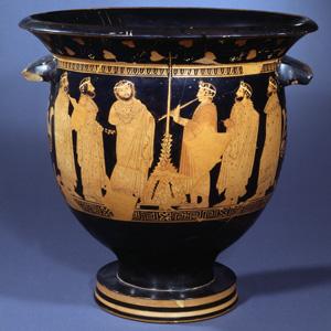 En digter, en fløjtespiller og et kor af mænd står omkring en majstang. Stangen er smykket med efeuranker, og alle mændene har efeukranse om håret. Scenen udspiller sig ved Anthesteriefesten for vinguden Dionysos. Fra Athen, 430-400 f.Kr.