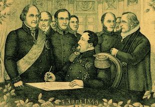 Frederik 7. underskriver Grundloven 5. juni 1849. Litografi, formodentlig 1874.